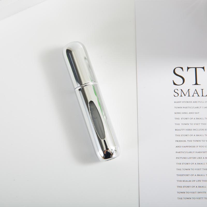 Compact 5ml Self-Pump Spray Perfume Bottle with Aluminum Press Design