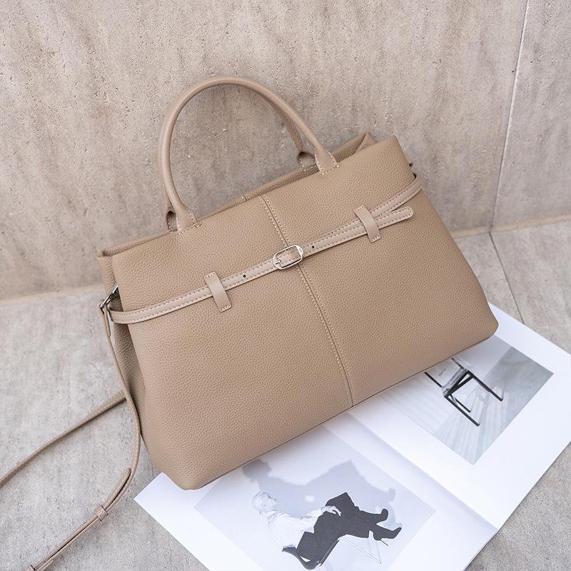 Винтажная кожаная женская сумка, новая вместительная сумка-платина для通勤, женская сумка через плечо, портативная сумка-тоут.