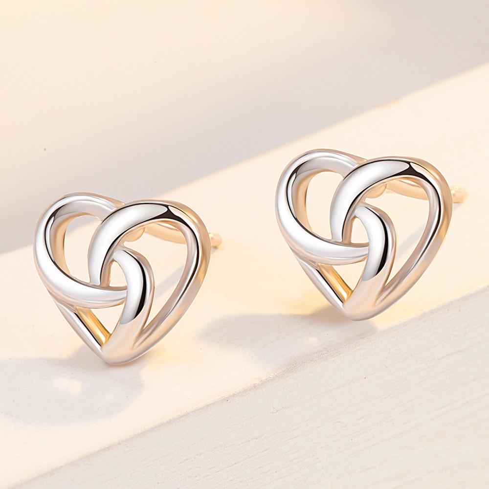 Heart-Shaped Hollow Korean Earrings: Simple, Cold Style for Women