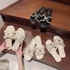 Xiaoxiangfeng flat-bottomed slippers women's outer wear 2025 summer new soft-bottomed fairy versatile pearl seaside sandals