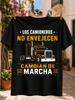 Испанский Los Camioneros No Envejecen оранжевая контурная графика грузовика и жирная типографика Cambian De Marcha Унисекс Вся футболка