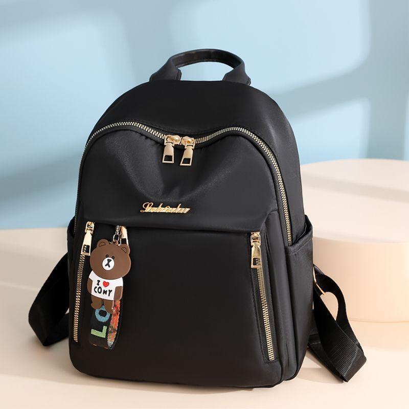 Letter Stylish Oxford Fabric Backpack For Women With Water Resistant Design And Spacious Interior For Travel
