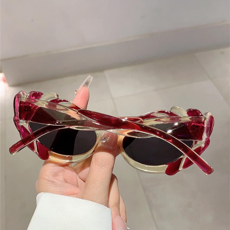 Women's new cat's eye small frame personalized sunglasses, novel and versatile fashionable avant-garde UV-proof sunglasses