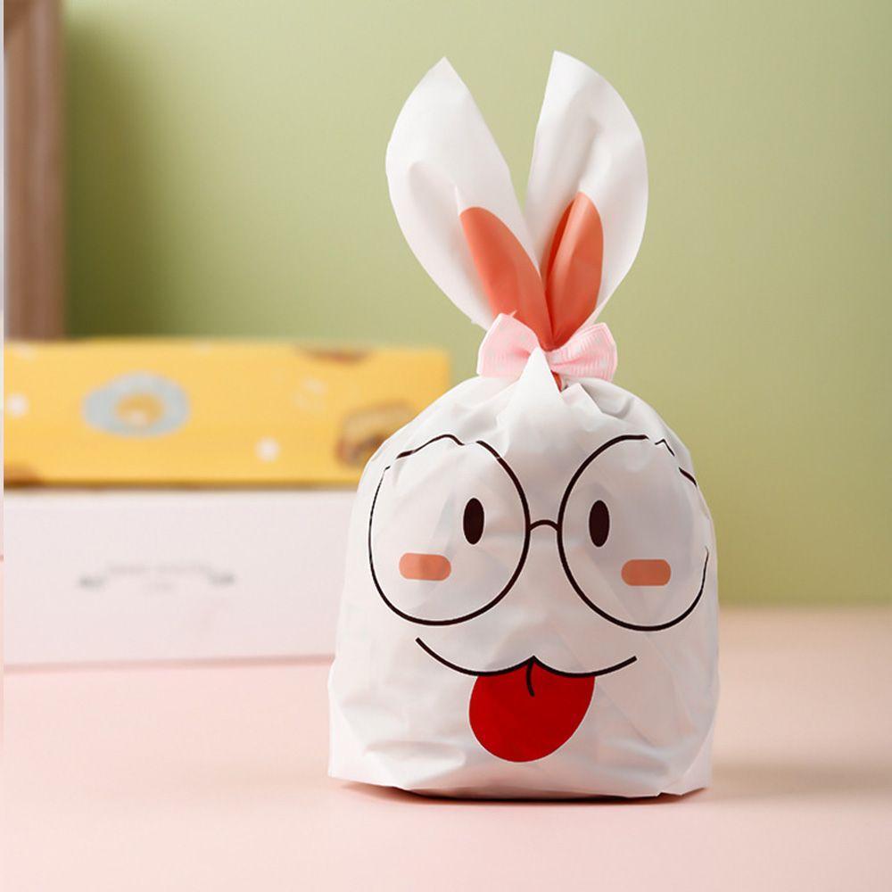 50 шт. Новые пасхальные картонные мешочки с ушками кролика, пластиковые мешочки для конфет в виде животных для детей, упаковка для печенья на день рождения, подарки своими руками