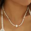 Bohemian Four-Leaf Clover Pendant Necklace: Mother-of-Pearl Beaded Choker with Seed Beads