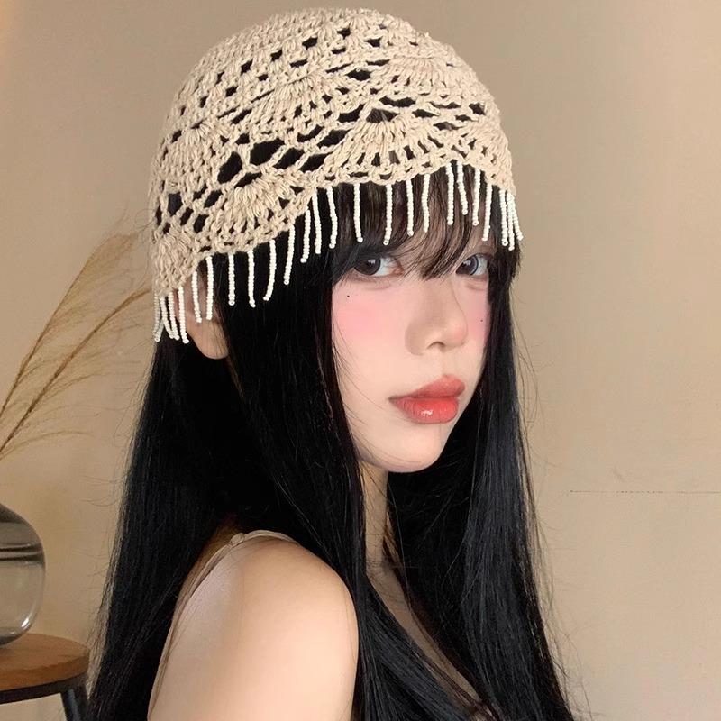 Spring and summer hand-woven hollow bald hat women's crochet ethnic style fringed pullover hat bohemian style knitted