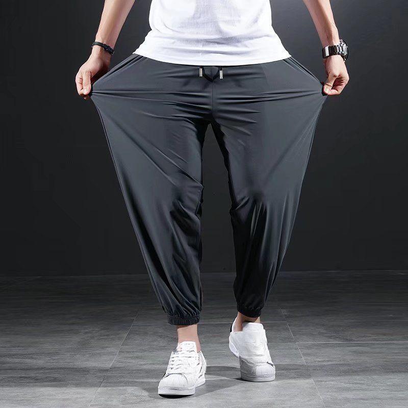 Эластичные повседневные брюки Ice Silk Быстросохнущие мужские летние тонкие спортивные брюки Fat Plus Fat для увеличения свободных ног Брюки Nine Point