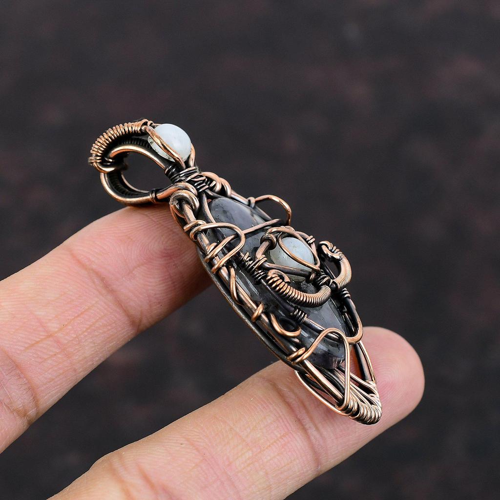 Дурной глаз Иолит Подвеска из солнечного камня Медная проволока Обернутая подвеска Радужная подвеска из лунного камня Красивые ювелирные изделия из драгоценных камней Подвеска ручной работы для подарка