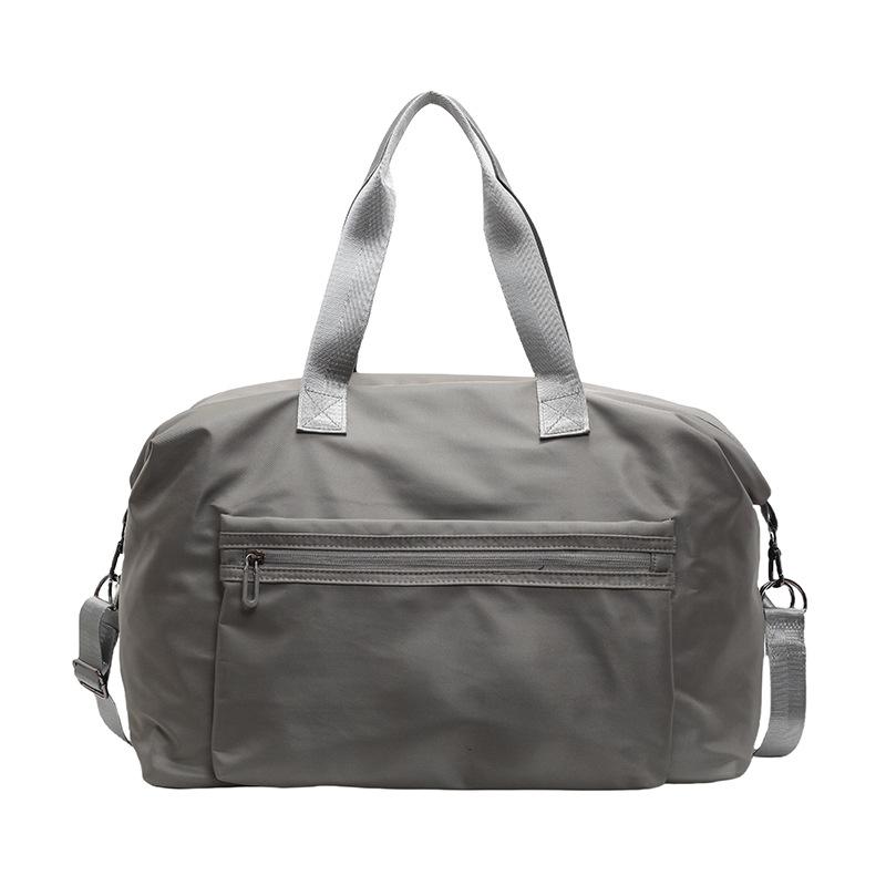 Простая повседневная дорожная сумка большой вместимости для мужчин и женщин студентов во время школьных каникул. Сумка для багажа для рычага