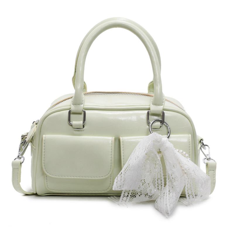 Корейская версия популярной весенне-летней дофаминовой простой портативной сумки-бостонки, нишевая повседневная сумка-мессенджер в иностранном стиле для通勤, женская