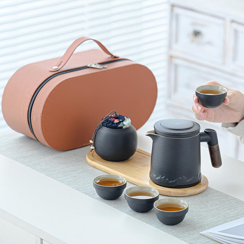 Ceramic Travel Tea Set, Portable Bag, Express Cup, One Pot, Four Cups, Tea Can, the Whole Set of Kung Fu Tea Set, Mountain Language Cup.