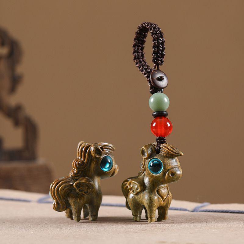 Twelve Zodiac Animal Charms Green Sandalwood Set: Rat, Ox, Tiger, Rabbit, Dragon, Snake, Horse, Sheep, Monkey, Rooster, Dog, Pig.