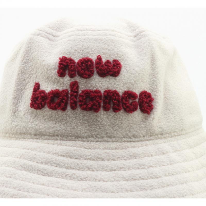 New Balance Детская флисовая панама со съемными ушками цвета слоновой кости