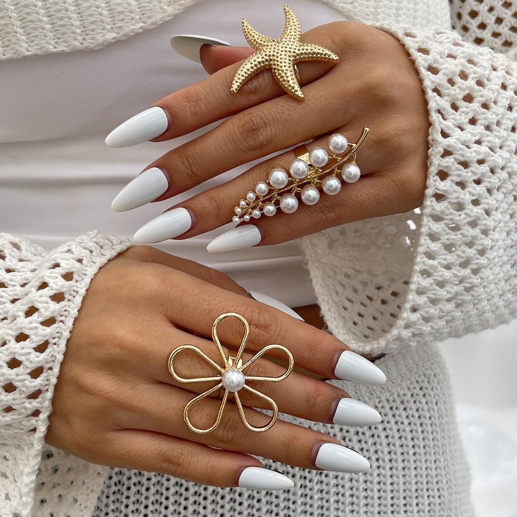 Модные многослойные изделия из нерегулярного сплава с ветровым покрытием, инкрустированные жемчугом, набор колец Dendritic, простая тенденция, высокое чувство женских украшений