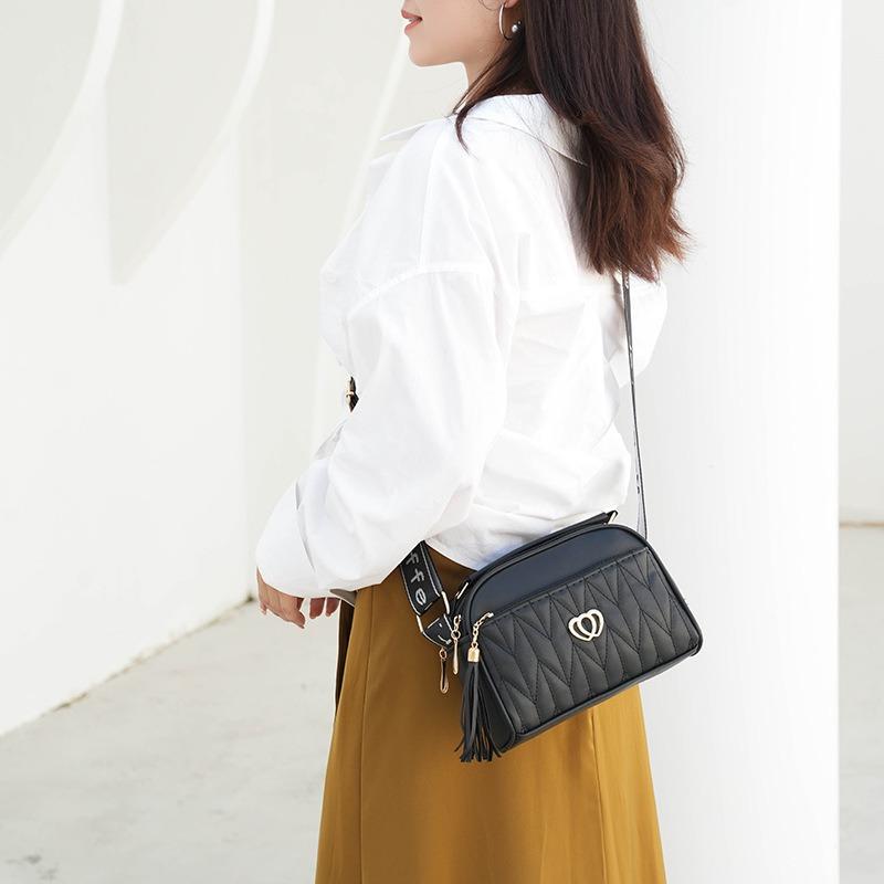 Autumn and winter new women's bags fashionable multi-layer shoulder bags women's messenger fringed double love versatile commuter handbags