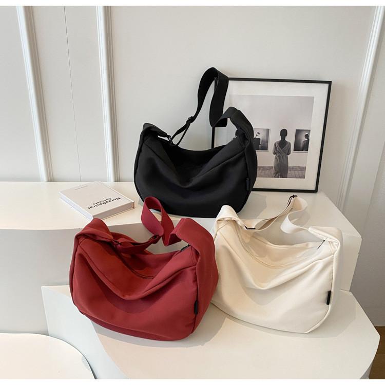 Large Capacity Canvas Dumpling Bag With Minimalist Urban Style