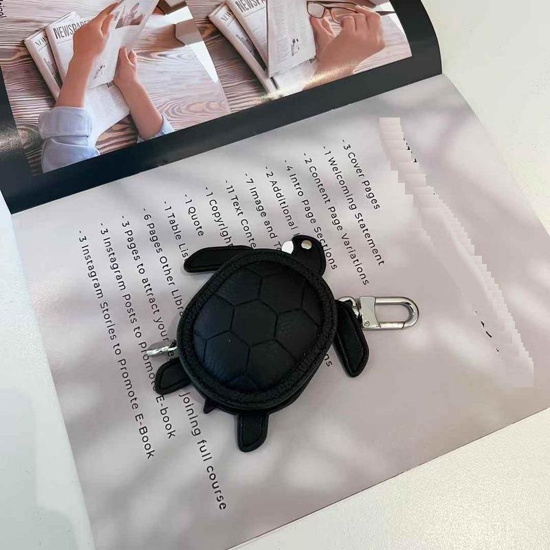 2025 Новый кожаный кулон Head Layer кожаный мини-кошелек для наушников Черепаха кулон Cross Border