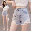 Stylish Hole Denim Shorts: High-Waisted, Floral Embroidery, Pearl/ Stud Details