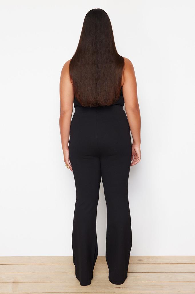 Женские стильные черные трикотажные брюки с расклешенной талией больших размеров для похудения
