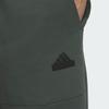 adidas Трикотажные спортивные брюки City Escape для мужчин, цвет плющ-зеленый IX8350