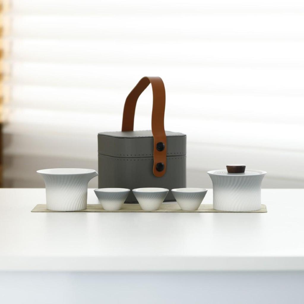 Outdoor Portable Ceramic Tea Set: One Pot, Three Cups, Gradient Grey Glaze for Travel and Business Trips