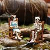Yousheng Skeleton Couple Figurine Resin Male And Female Skeleton Ornament Skeleton On Rocking Chair Statue for Halloween Mantel Shelf Decor