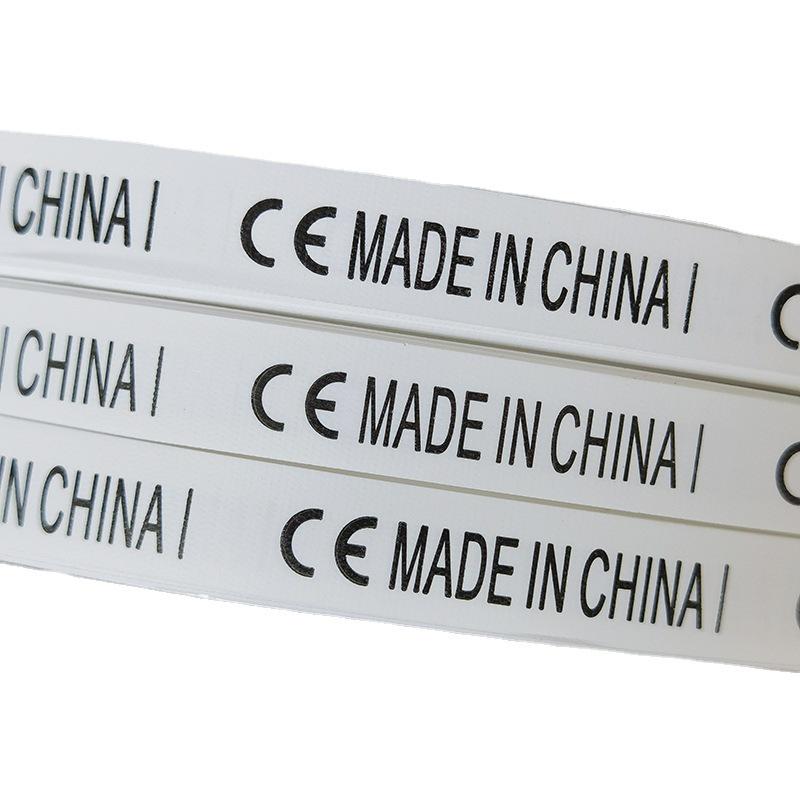 Этикетка для стирки нетканого материала с маркировкой CE - белый фон, черный текст