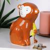 Ceramic monkey piggy bank