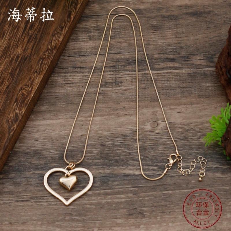 Новая глянцевая полая цепочка «змеиная кость» с подвеской в виде любви, женское простое и изысканное осенне-зимнее длинное ожерелье в форме сердца