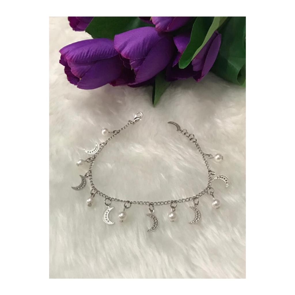 Женский браслет серого цвета со звездой