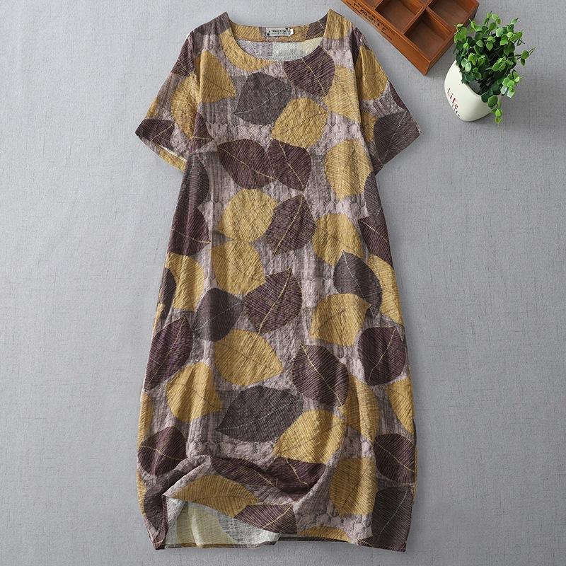 summer new loose printing medium and long dress that covers the belly and shows thinness