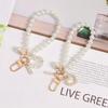 1pc Decorative Simple Imitation Pearl Mobile Phone Wristband with Cute Shell Heart-shaped Bracelet, Key Chain