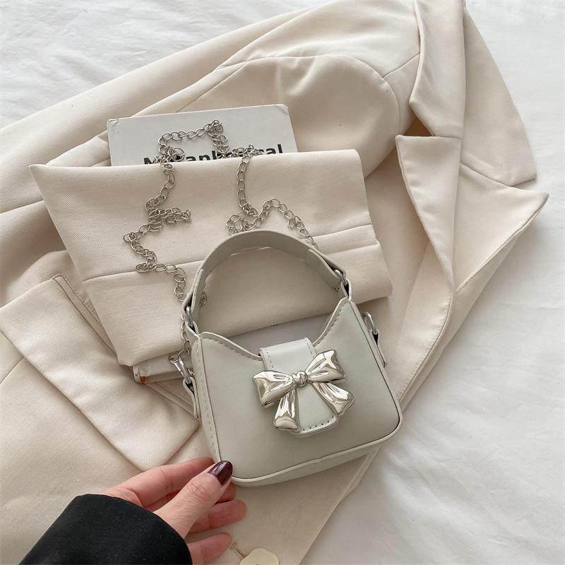 Сумка-бантик Niche 2025, новый весенне-летний тренд, милая и крутая мини-сумка-помада с цепочкой, маленькая женская сумка через плечо