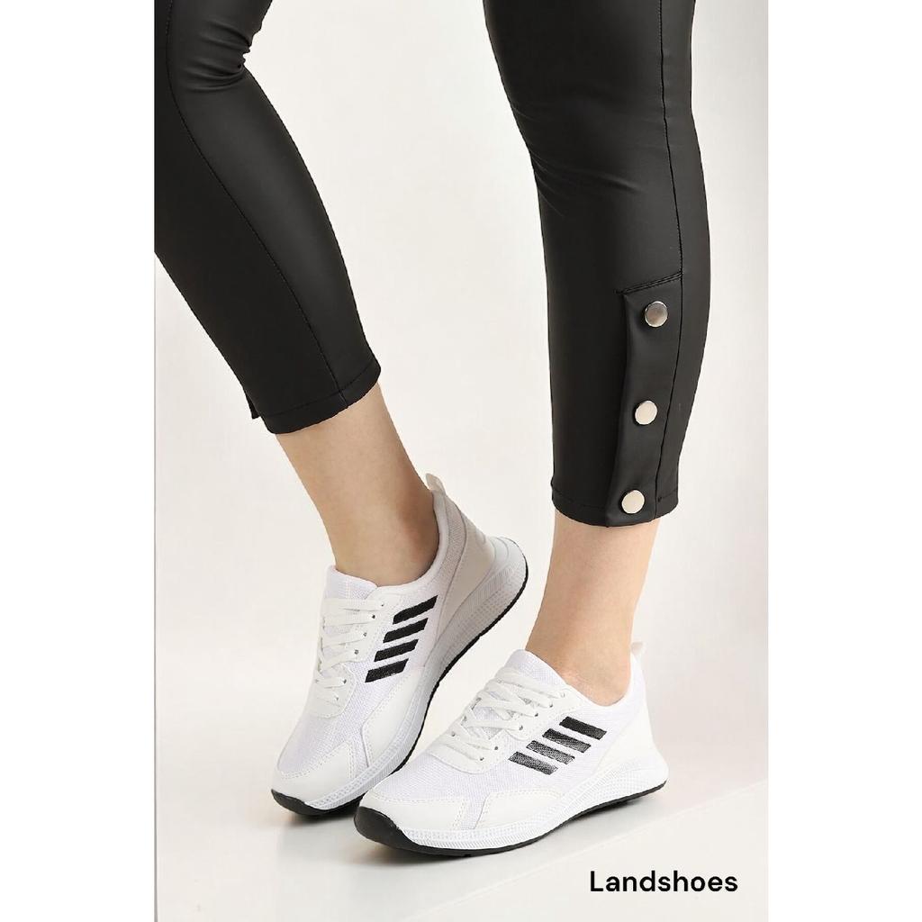 Бело-черные спортивные туфли унисекс в полоску на плоской подошве со шнуровкой