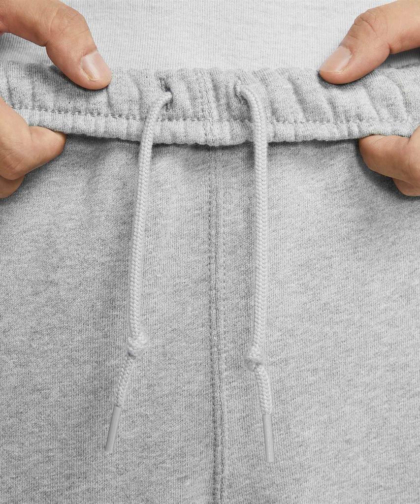 Nike Штаны с манжетами Solo Swoosh из флиса M - Темно-серый меланж:Светло-дымчатый серый:Белый / Hv1089-063