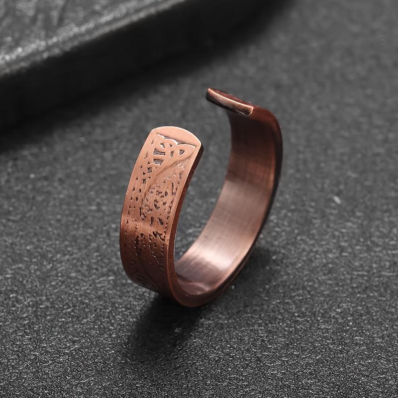 A vintage bohemian-style magnetic open ring adorned with a World Tree motif.