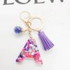 Европейский и американский хит продаж брелок с английскими инициалами и фиолетовой кисточкой