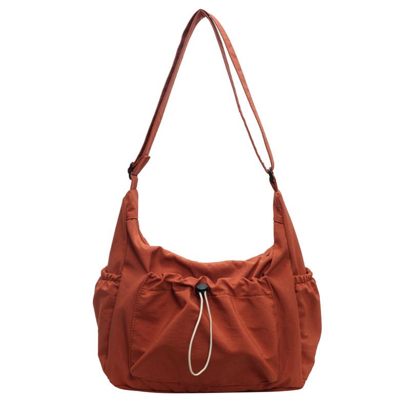 Canvas Ladies Crossbody Bag With Solid Color Drawstring Design For Daily Use And Urban Style