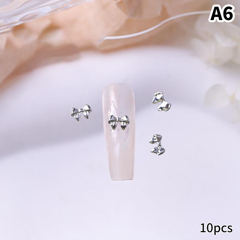 10 шт./пакет в форме бабочки, звезда, цветок, подвеска для ногтей, серебряный сплав для ногтей, жемчужные украшения, аксессуары, принадлежности для ногтей