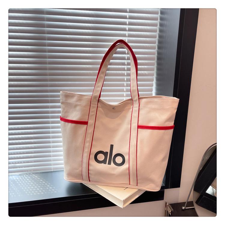 Versatile Large Capacity Canvas Tote: Fashionable Shoulder or Handheld School Bag for Commuting and Shopping