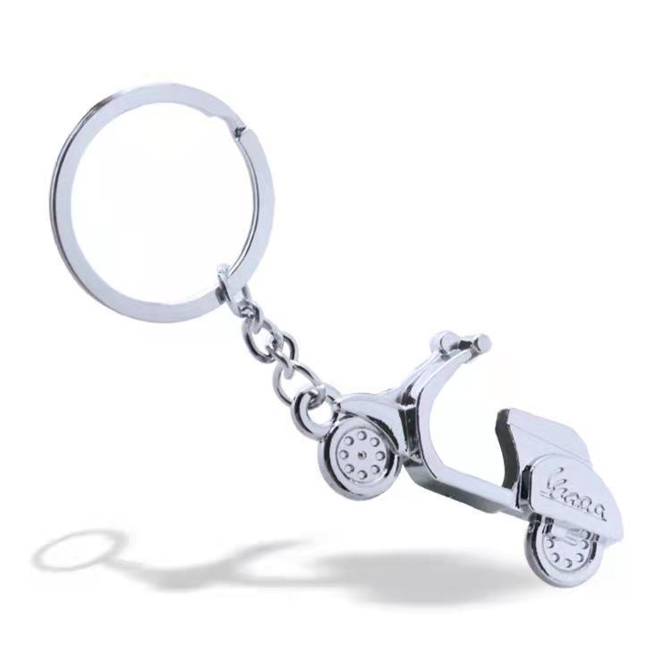 Металлический брелок для ключей в виде мотоцикла с лазерным логотипом - уникальный рекламный подарок или небольшой жетон.