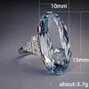 Fashionable Oval Blue Zircon Ring with Large Grain Design in Alloy