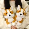 Горячая оптовая продажа Праздничные подарки 28 см Стоящая плюшевая игрушка Корги Набивная кукла-рука Мультяшная милая подушка Домашний декор Подарок на день рождения для детей