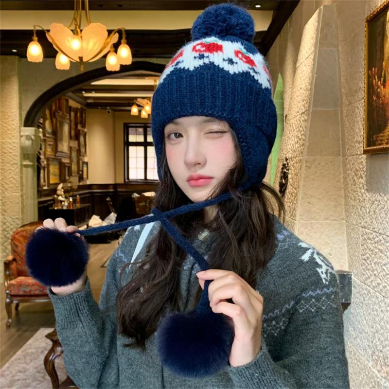 Autumn and winter warm ear protection wool hat new red Fair Island plaid cute hairball knitted hat children