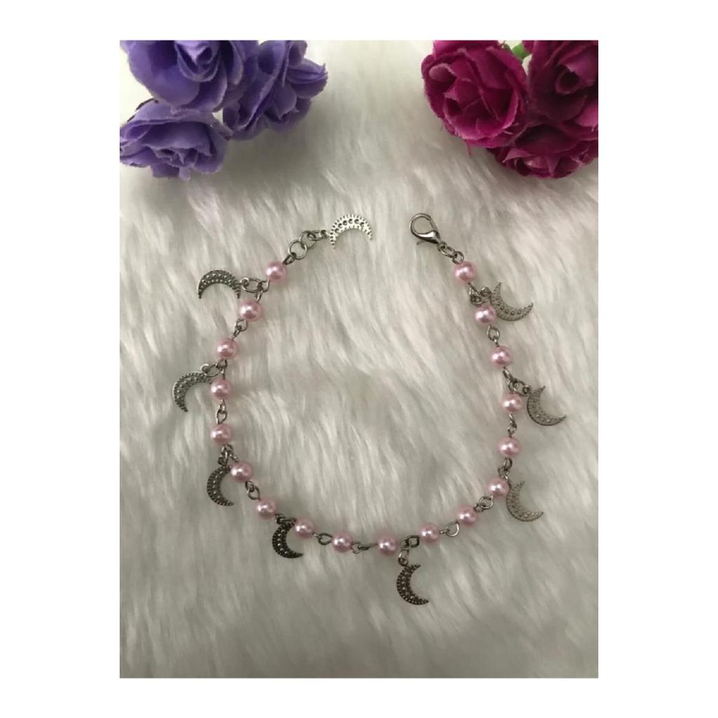 Женский браслет серого цвета со звездой