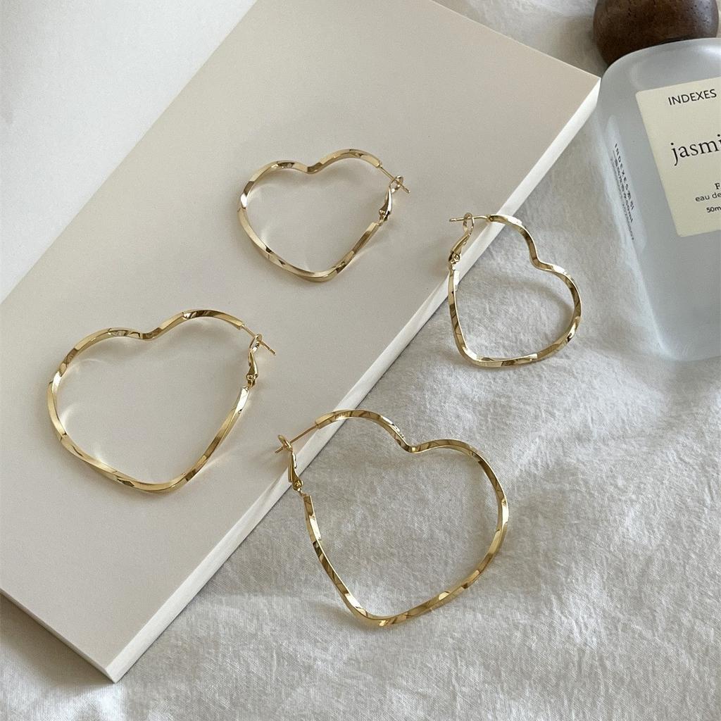 Простые серьги-иглочки в стиле ретро с закрученной серебряной любовью, женские нишевые, легкие, роскошные, темпераментные, уникальные, высококачественные серьги