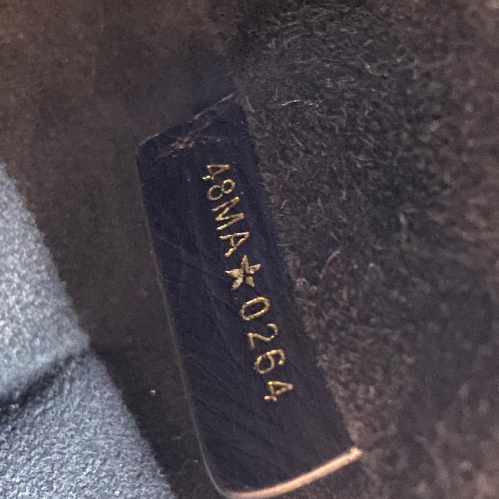 Подержанная женская сумка через плечо Christian Dior из черной кожи