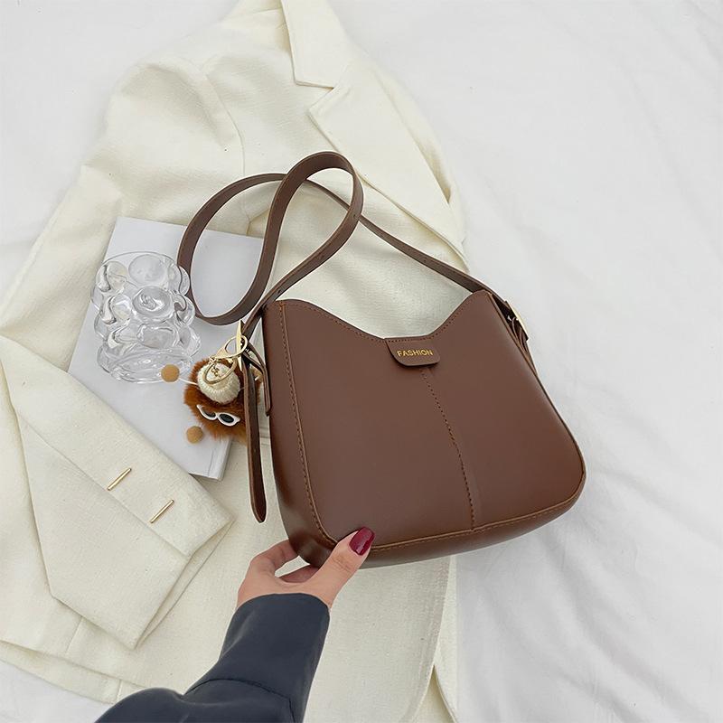 Повседневная сумка большой вместимости 2025 новая модная сумка-мессенджер женская на плечо однотонная простая сумка-ведро