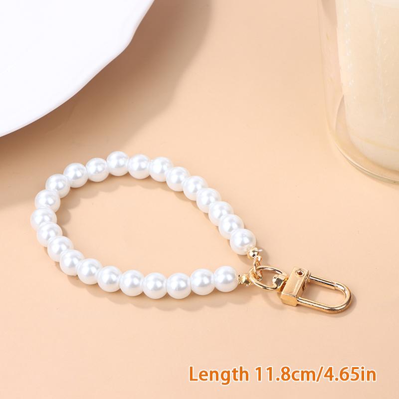 Брелок с имитацией жемчуга, сумка для наушников, подвеска на запястье, держатель для ключей из бисера, браслет из жемчуга, брелок для женщин, украшение для мобильного телефона