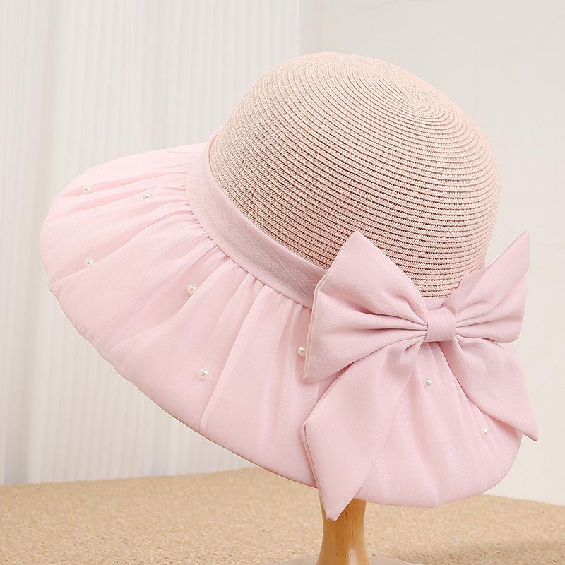 Spring and summer new women's straw hat big brim sun hat French pearl bow versatile sun protection hat travel